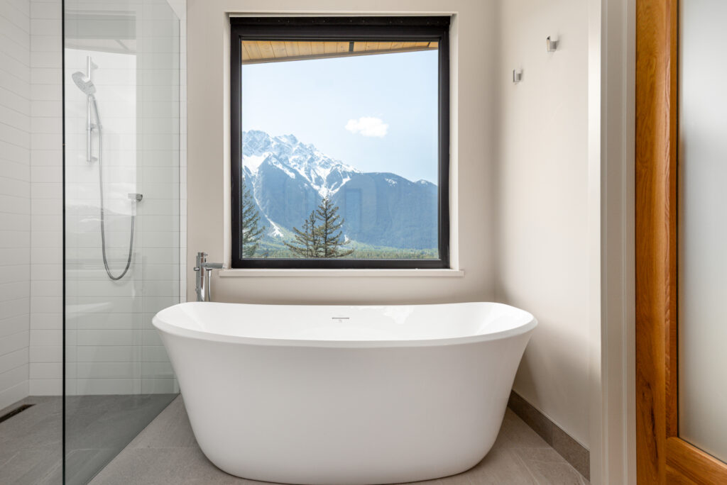 Freestanding bathtub with mountain view at Merlot Peak