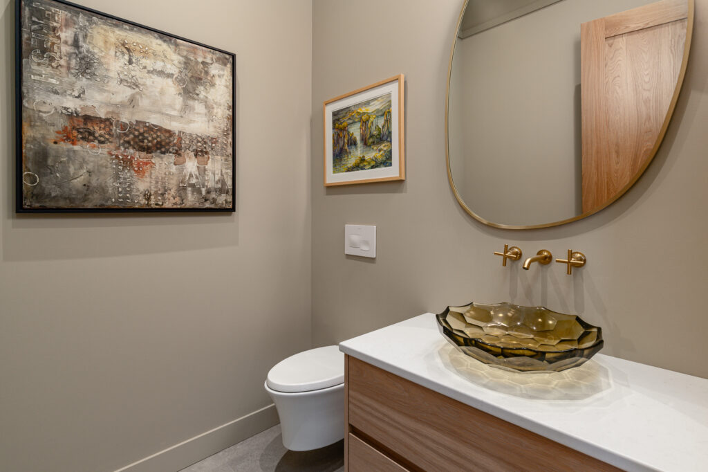 Powder room with vessel sink and artwork at Merlot Peak