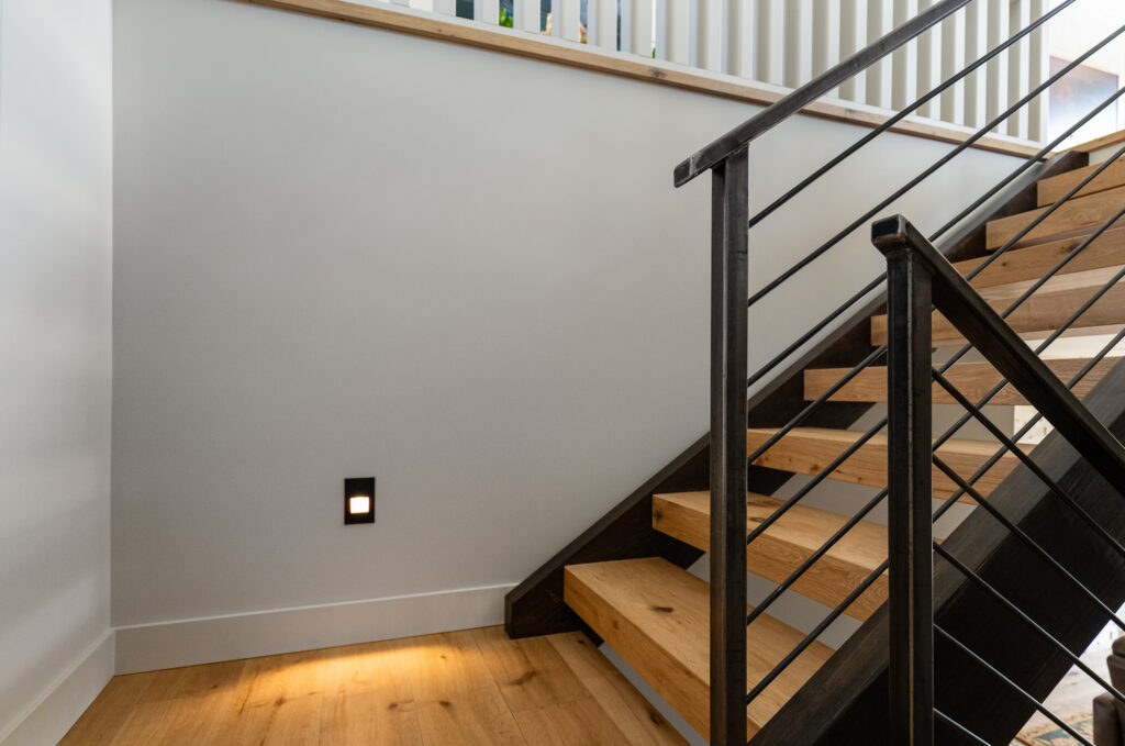 Wood and metal staircase detail at Merlot Peak