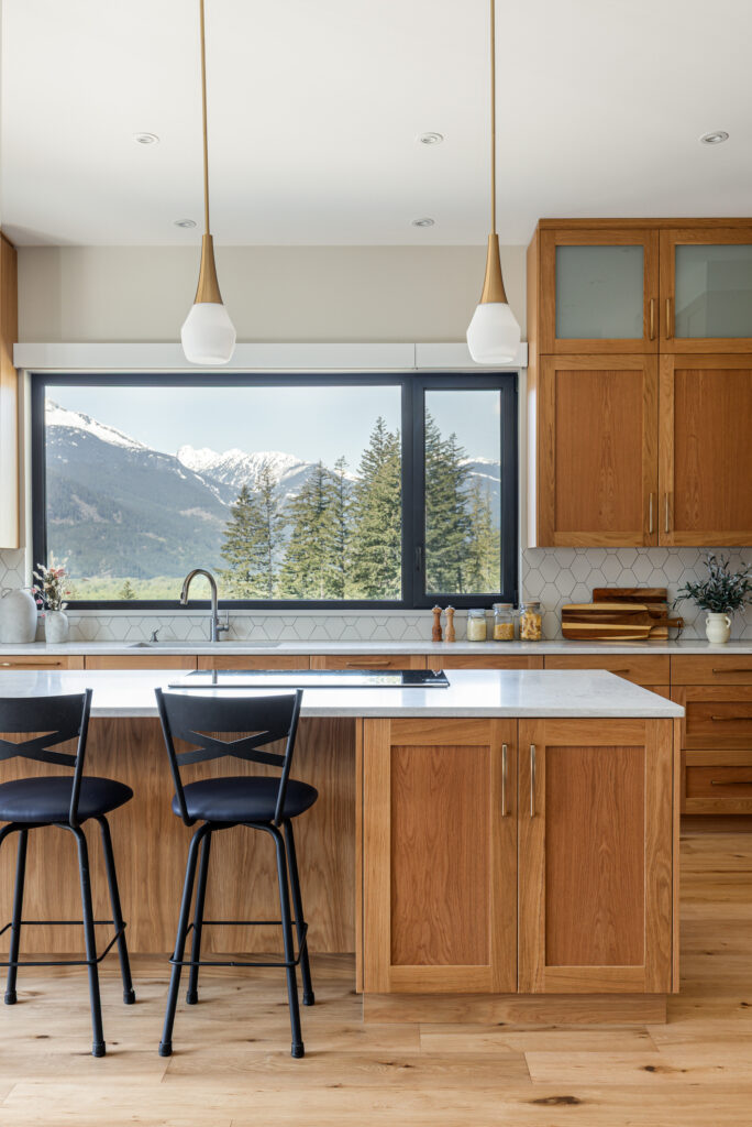 Kitchen bar seating and windows at Merlot Peak Custom Home