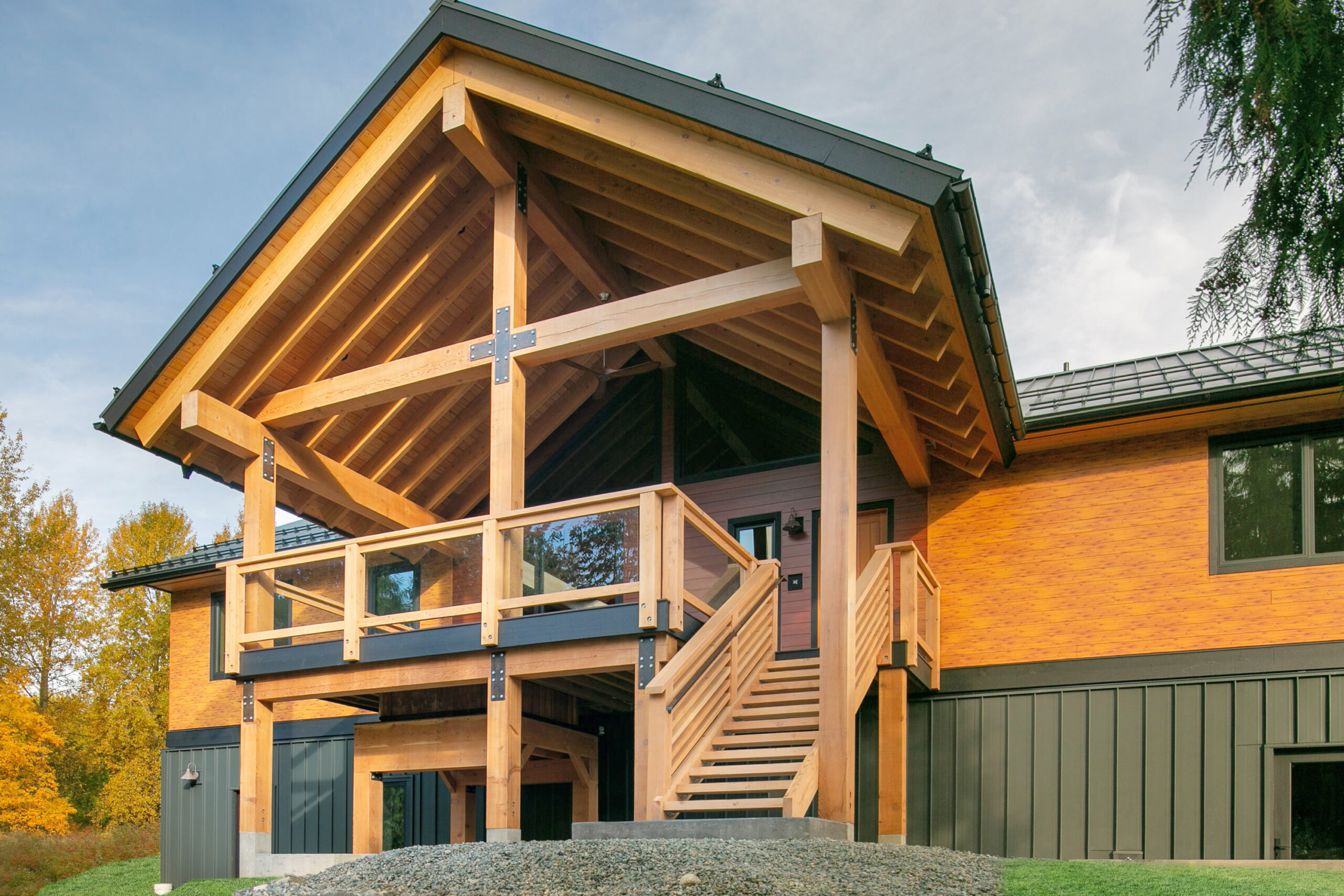 Exterior front elevation showcasing cedar siding and standing seam metal roof