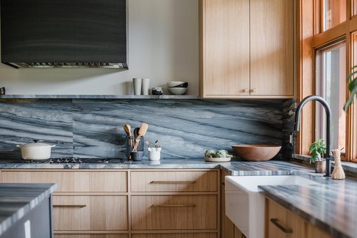 Kitchen cabinetry detail with Calacatta Cielo quartz countertops at Cedar Estates