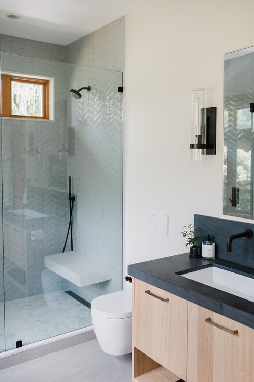 Primary ensuite shower with Cloud Chevron Mosaic tiles at Cedar Estates renovation