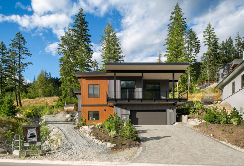 Custom home in Pemberton Newly built custom home in Pemberton featuring cedar and corrugated steel siding