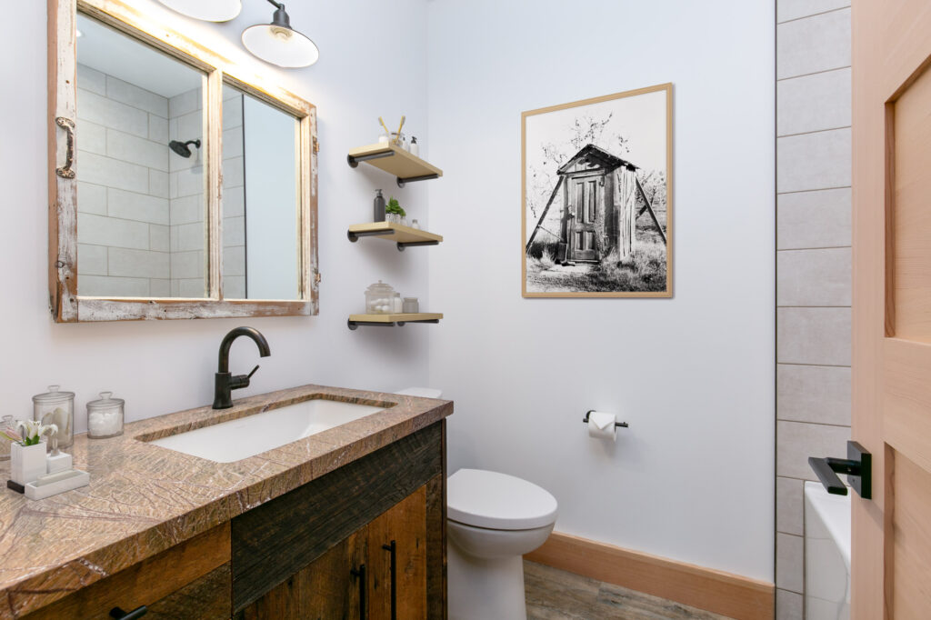 Guest bathroom with contemporary finishes and Egger Walnut cabinetry