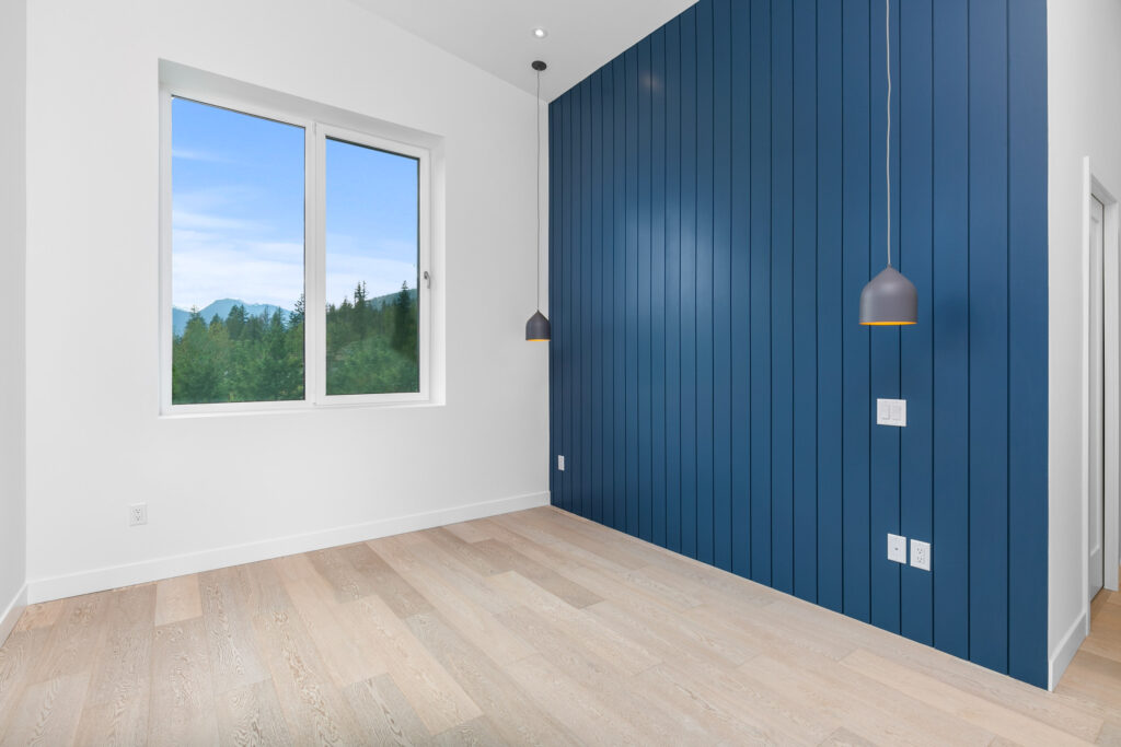 Bedroom Serene bedroom with large windows and minimalist design overlooking the mountains