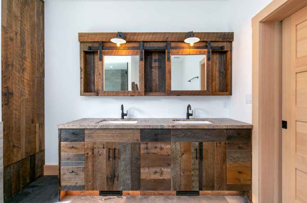 Custom double vanity in primary ensuite with locally sourced barnboard