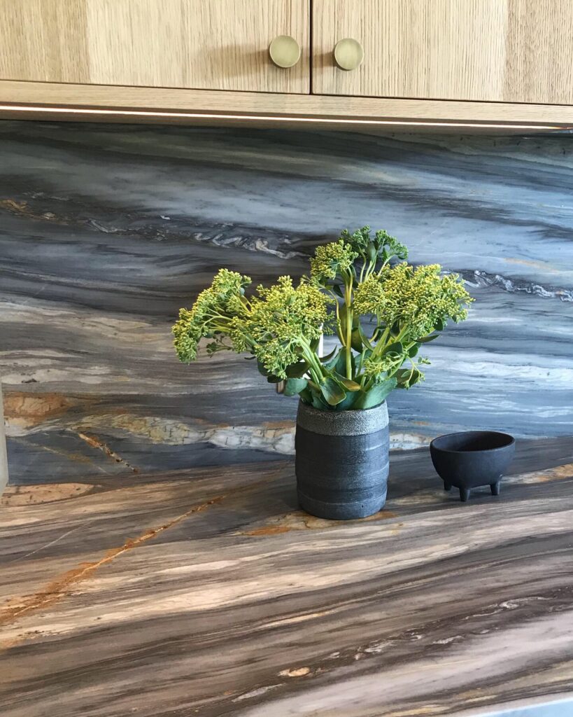 Close-up of Calacatta Cielo countertop and backsplash with natural veining at Cedar Estates kitchen renovation