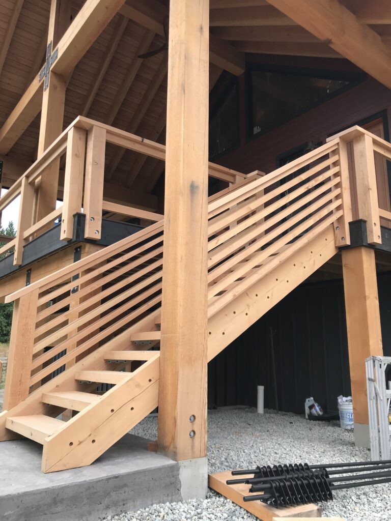 Side angle of home showing upper balcony