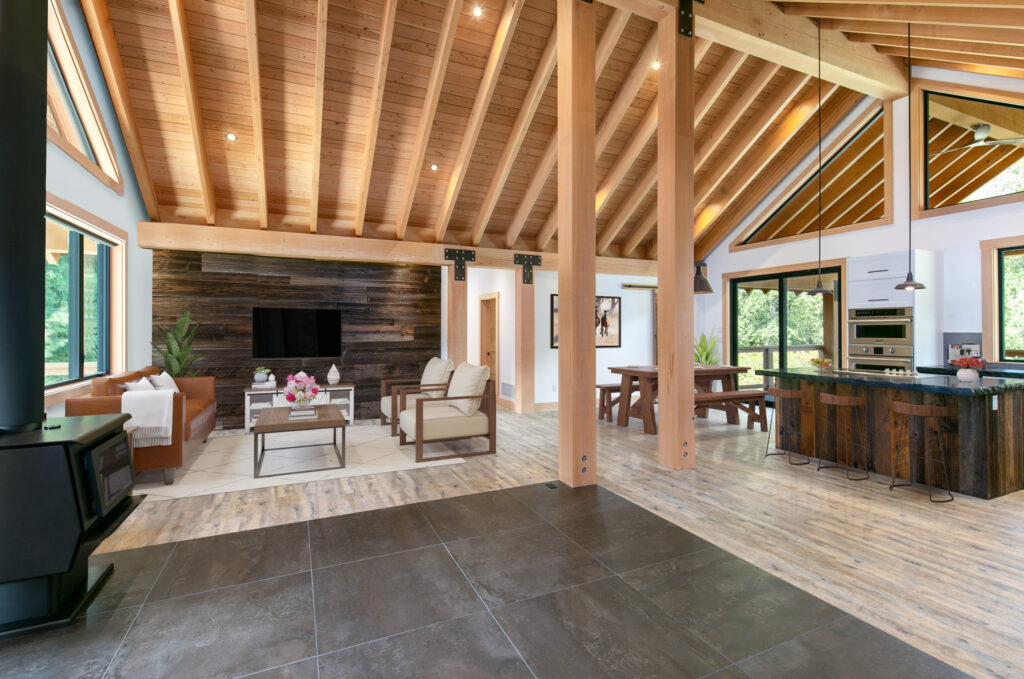 Open concept kitchen and living room with vaulted ceilings