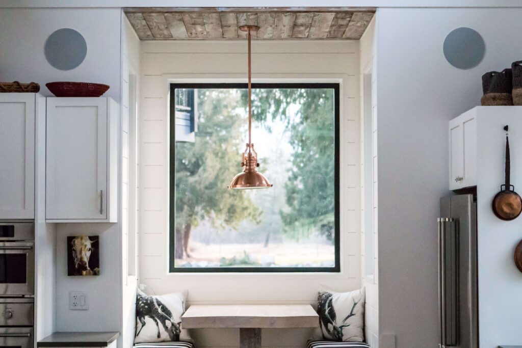 Cozy breakfast nook with built-in bench and window view
