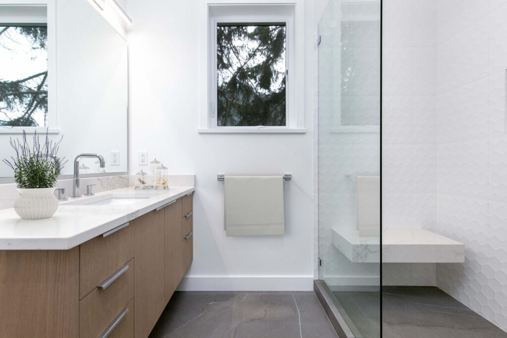 Minimalist bathroom design with large window