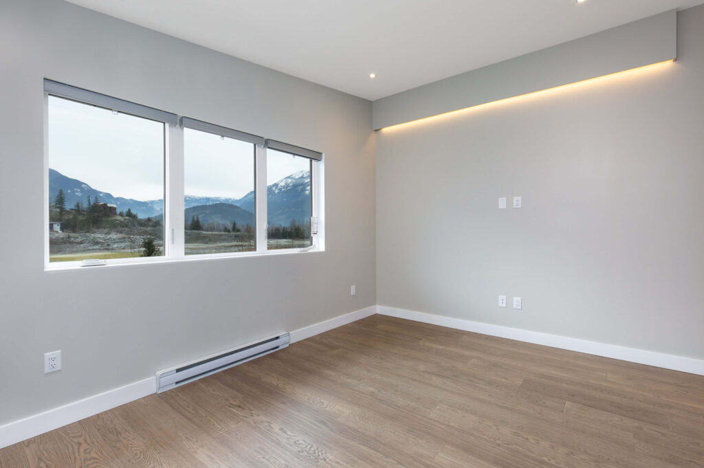 Bedroom Minimalist bedroom design with bold Night Blue feature wall and pendant lights