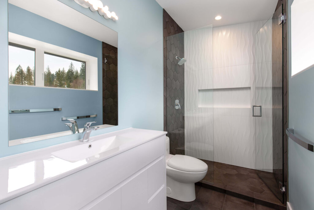 Bathroom Contemporary bathroom with white textured wall tiles and matte black fixtures